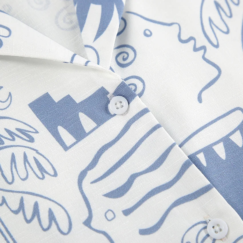 "Harleigh set featuring white and blue pattern design. Made of soft and durable material for a charming and versatile addition…