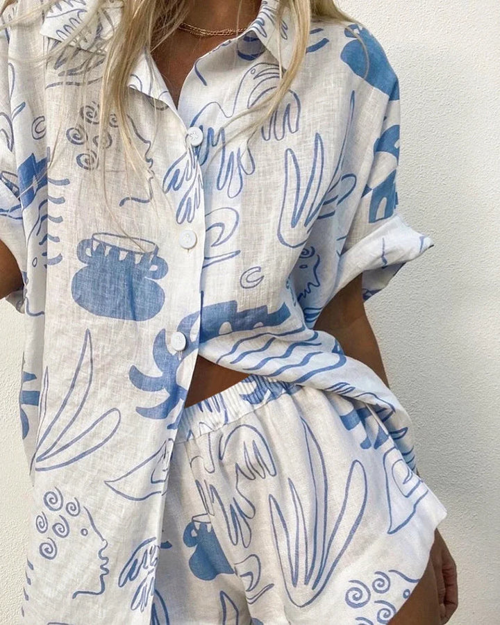 "Harleigh white and blue patterned set made of soft cotton fabric with a unique geometric design."