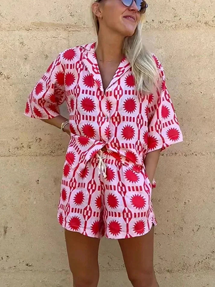 Pink short-sleeve shirt and shorts set by Majesty. Soft and breathable fabric with a ribbed texture. Ideal for casual summer…