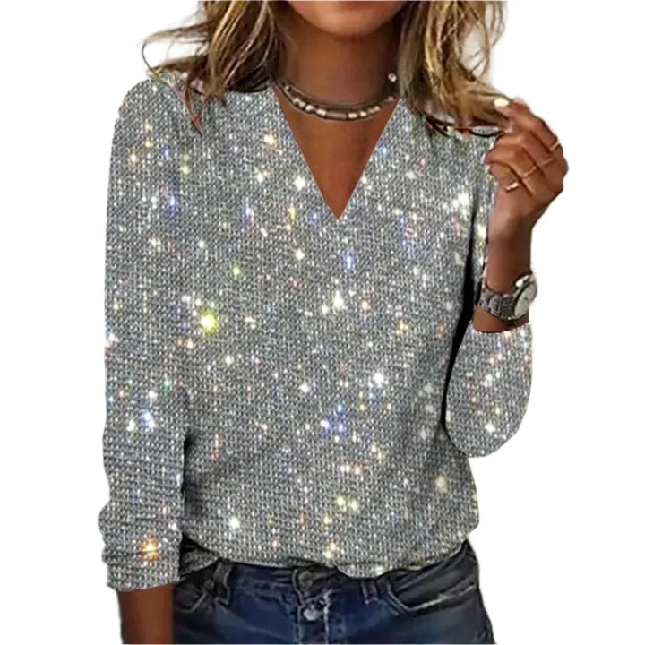 Stormy sequin embellished V-neck top featuring shimmering design, perfect for a touch of elegance.