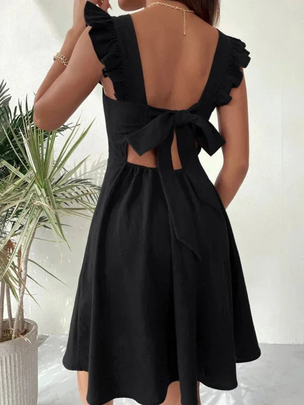 Flared mini dress in Viviane with delicate ruffle details, perfect for a casual yet elegant look.