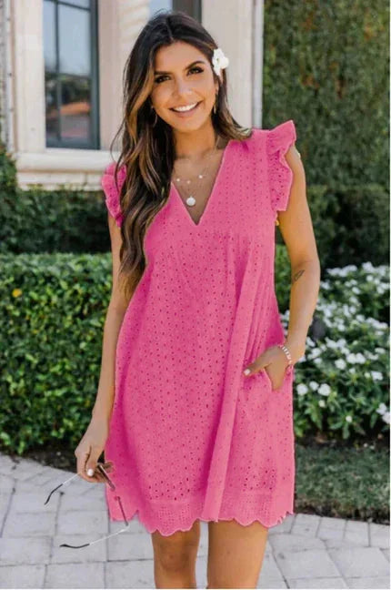 Pink lace dress with side pockets, sleeveless design. Perfect for summer outings, weddings, or special occasions.