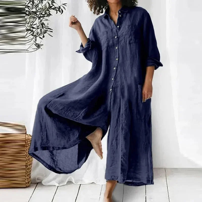 "Kacey maxi dress in flowy fabric with buttoned front and convenient pockets in a relaxed drape style."