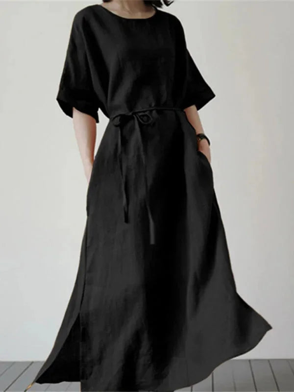 Nori long dress in soft fabric w/ adjustable tie, subtle V-neck, and flowing silhouette in versatile shade.