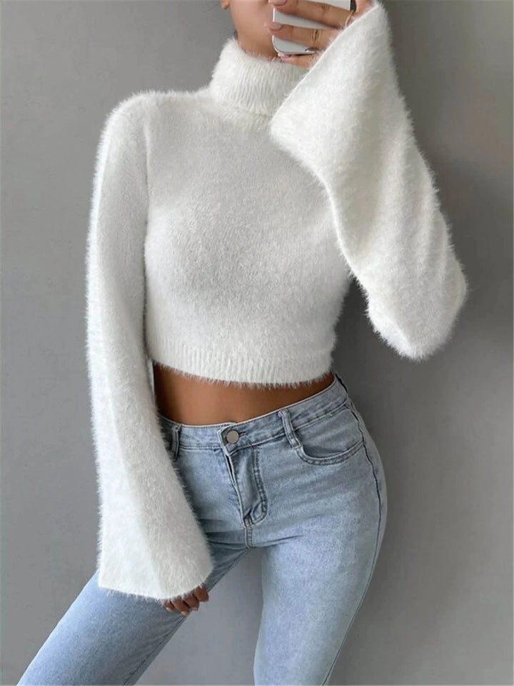 White cropped turtleneck sweater made of soft fluffy material by Spencer. Perfect for cozy and stylish winter outfits.