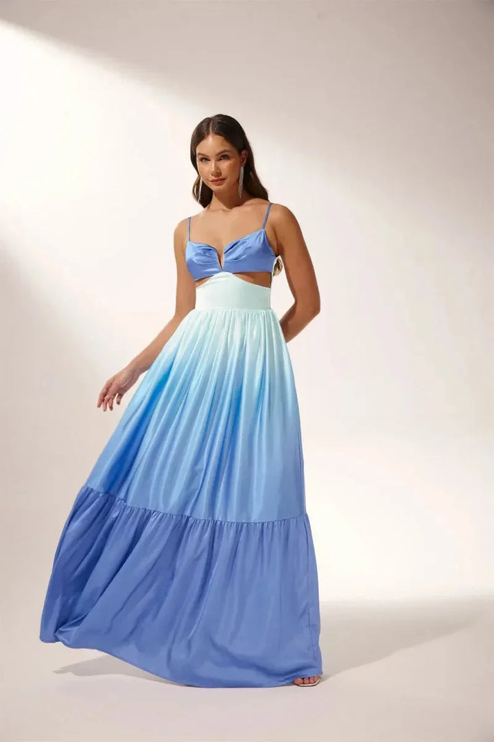 "Mahina - Ombre blue maxi dress showcasing chic cut-outs, perfect for a fashionable statement. Made with lightweight,…