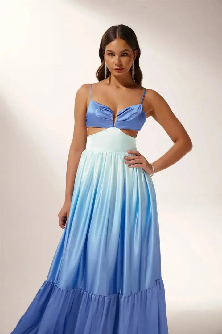 "Mahina - Ombre blue maxi dress featuring chic cut-outs, perfect for a relaxed yet sophisticated look."