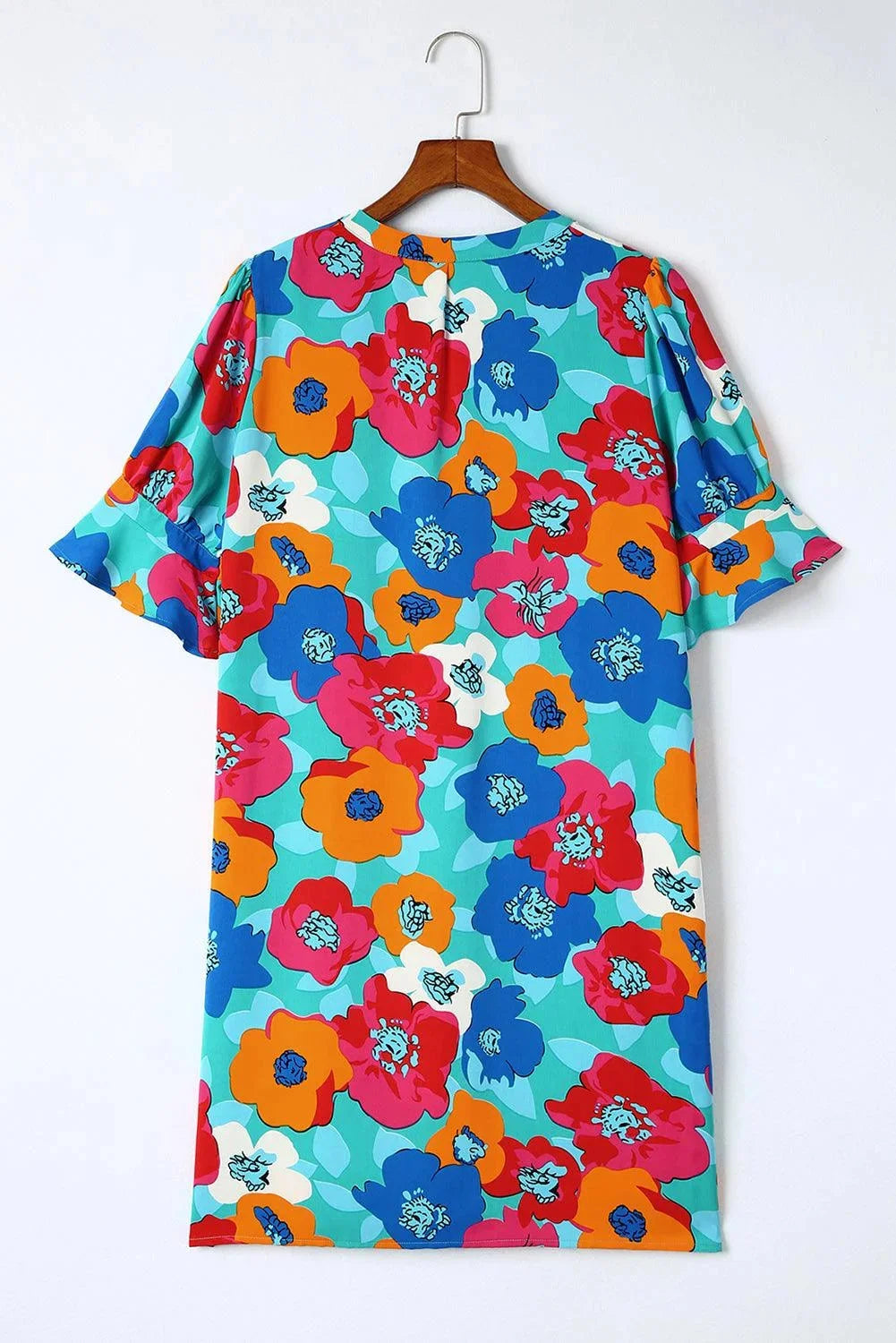 "Adria V-neck shift dress featuring a floral pattern, made with lightweight and airy fabric for a comfortable and stylish…