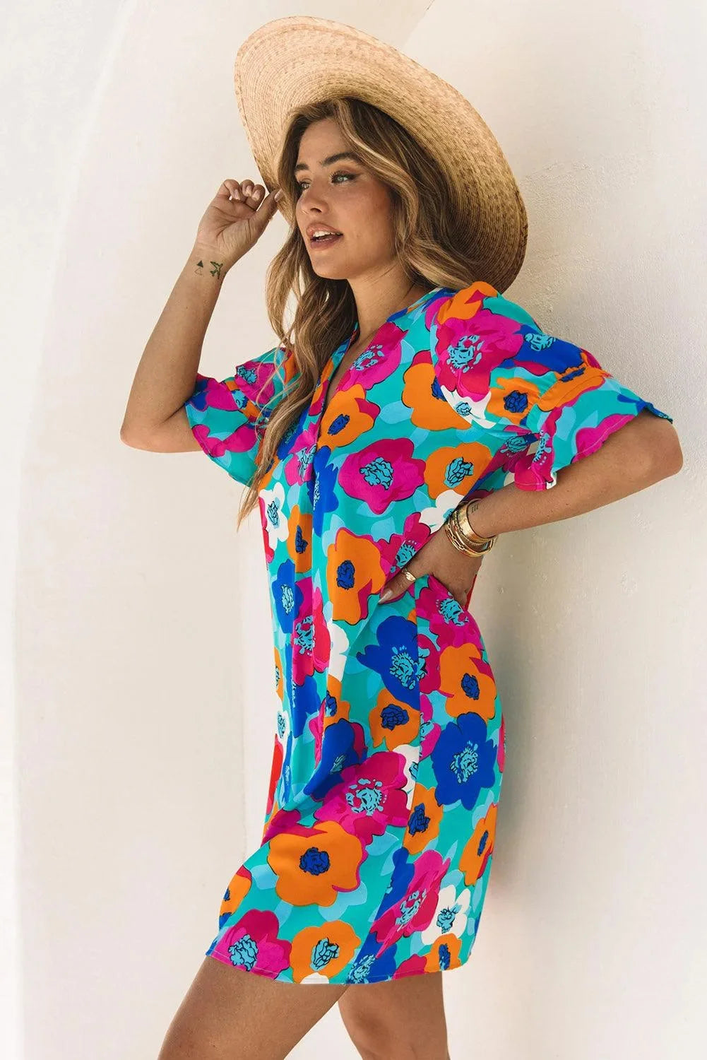 "Adria V-neck shift dress with floral pattern in lightweight fabric for a feminine and elegant look."