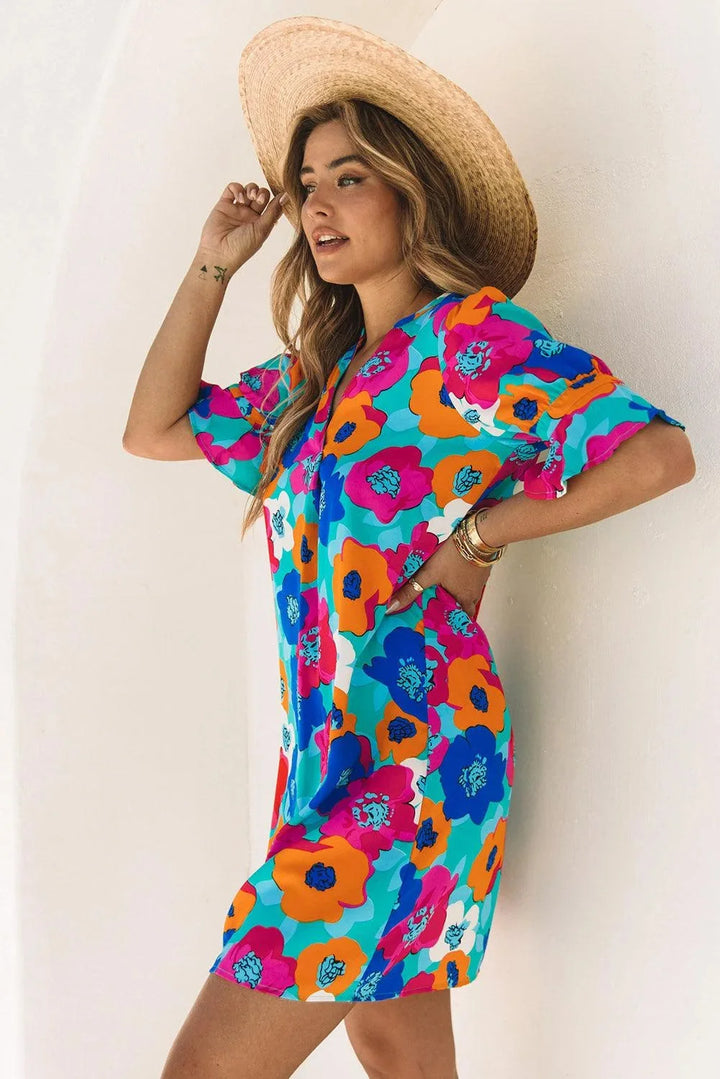 "Adria V-neck shift dress with floral pattern in lightweight fabric for a feminine and elegant look."