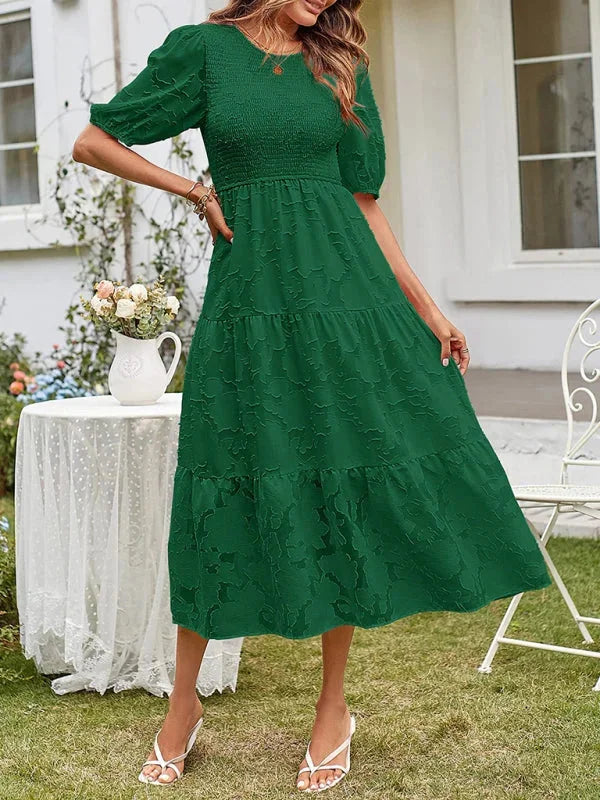 Green floral textured tiered midi dress by Emily, featuring lightweight fabric and a flattering tiered design.