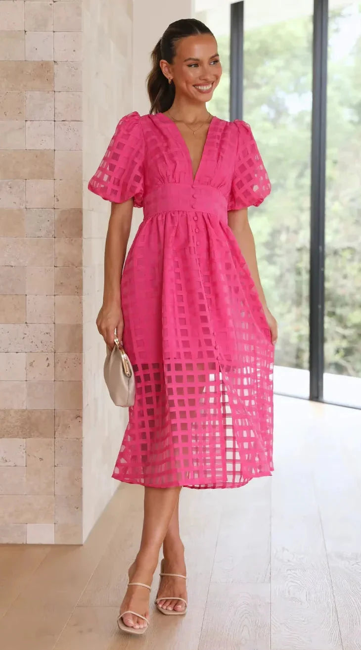 "Adrielle women's V-neck midi dress in textured fabric with a flattering silhouette."
