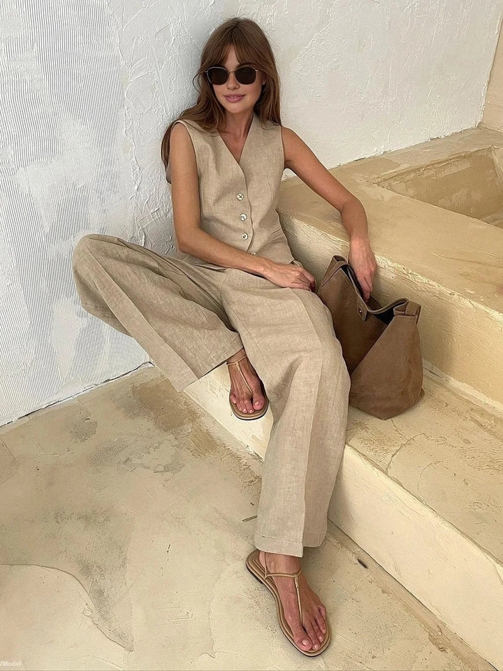 Sleeveless top and wide-leg pants set in Beautiful material, perfect for a chic and sophisticated look.