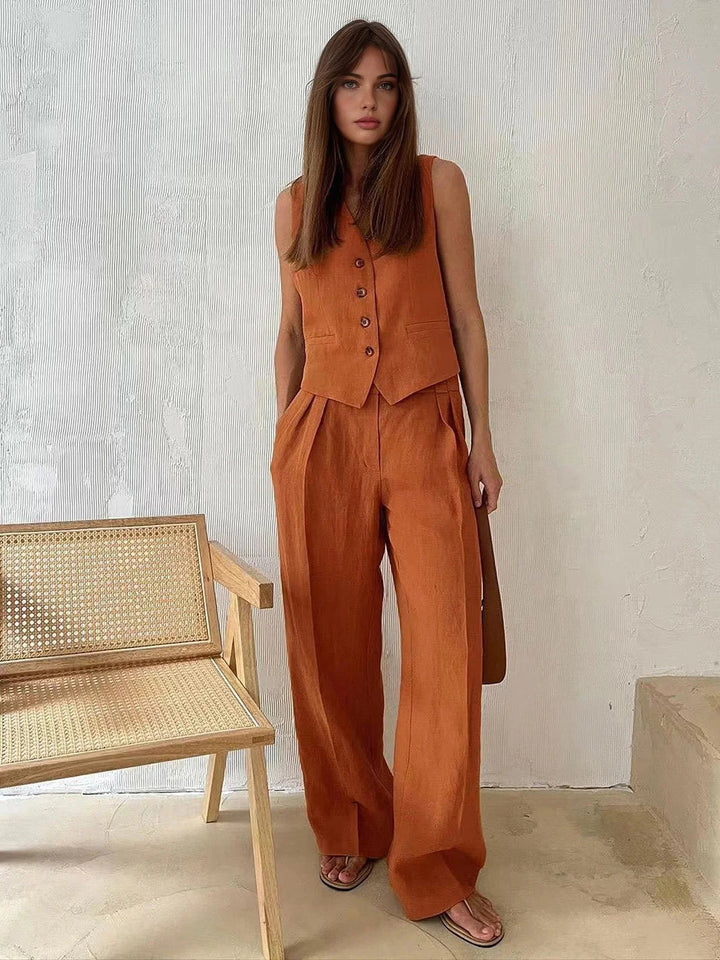 Orange sleeveless top and wide-leg pants set in a cozy and breathable fabric, perfect for a casual and stylish look.