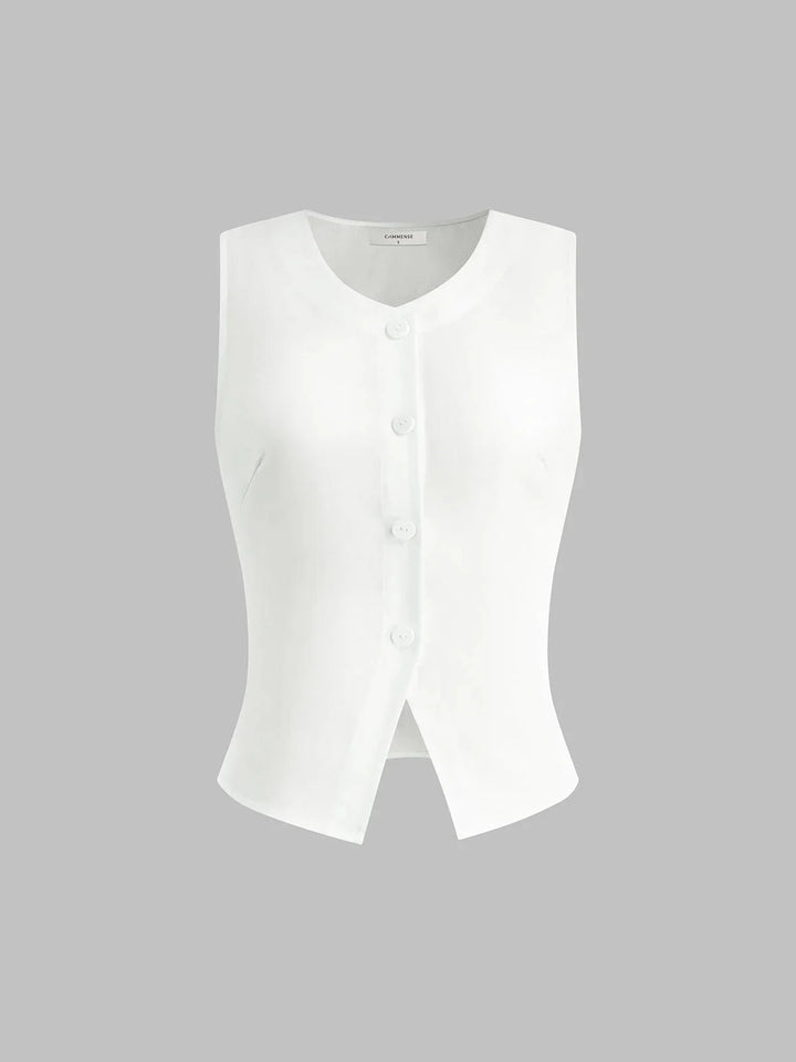 White sleeveless button-up collared shirt by Noemi, featuring a sleek and timeless design perfect for a versatile and…