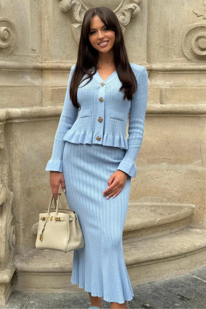"Women's fitted knitwear ensemble in soft wool-blend fabric with ribbed detailing and versatile styling, by Nancy."