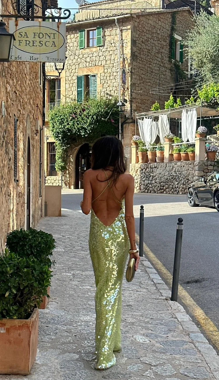 Floor-length lime green sequin dress with a shimmering finish, perfect for special occasions.