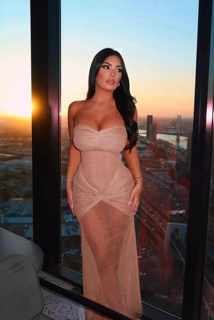 Beige maxi dress with sparkle detailing, strapless design. Ideal for special occasions, made from high-quality material.