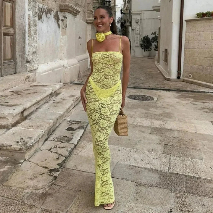 Yellow lace maxi dress with a sleek fitted design by Saffron.