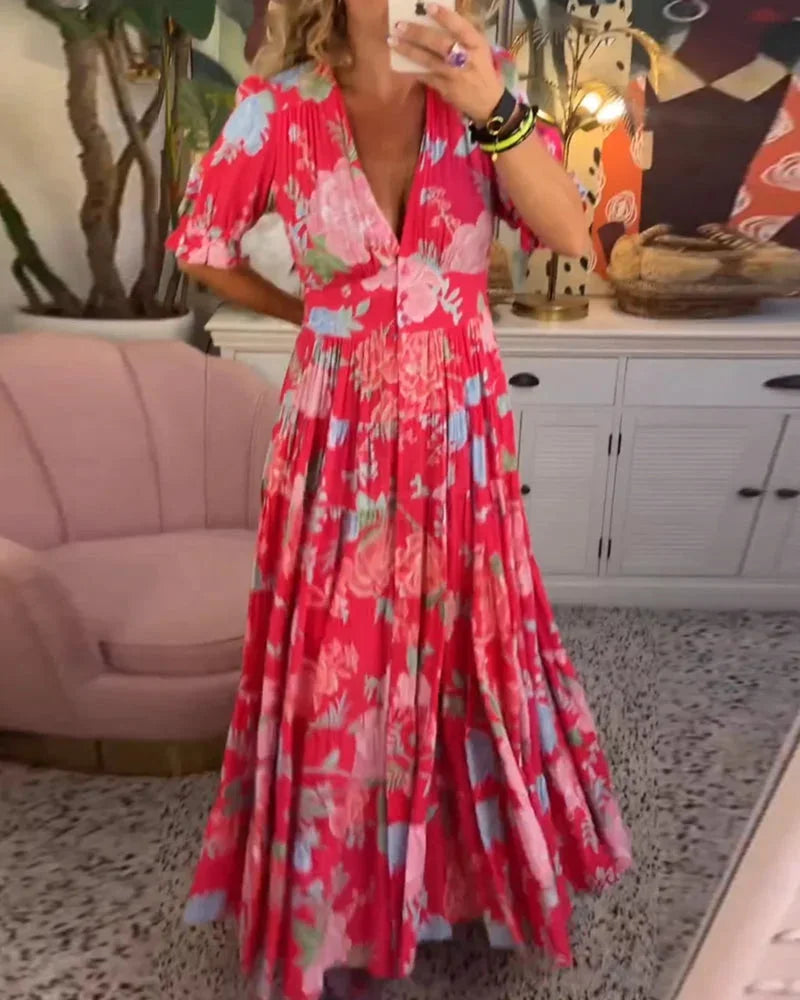 "Maja - Floral V-neck midi dress featuring a flowy skirt, perfect for both casual days and special occasions."