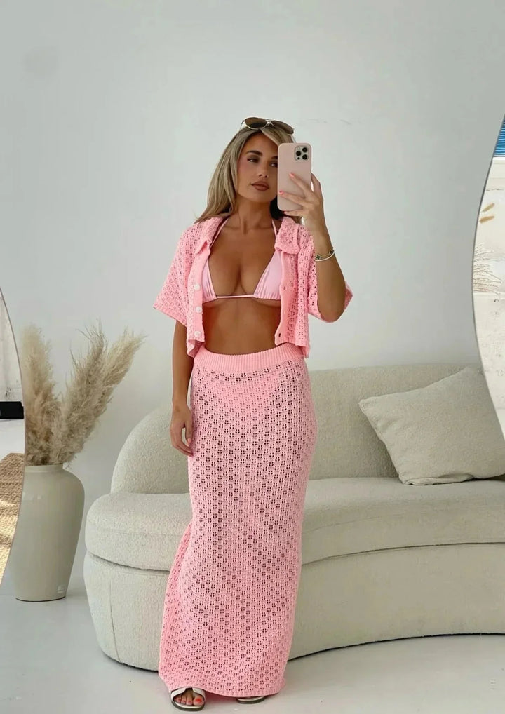 "Annora crochet knit top and skirt set in soft pastel knit, featuring intricate crochet details and textured design."