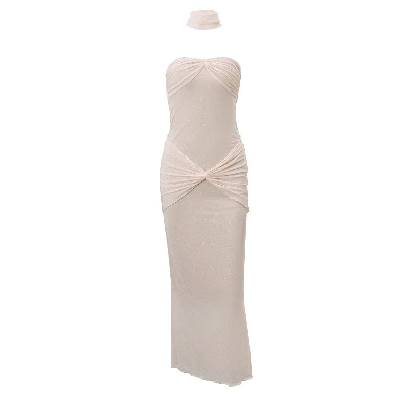 "Strapless maxi dress for women featuring shimmer detail, made of lightweight and comfortable fabric."