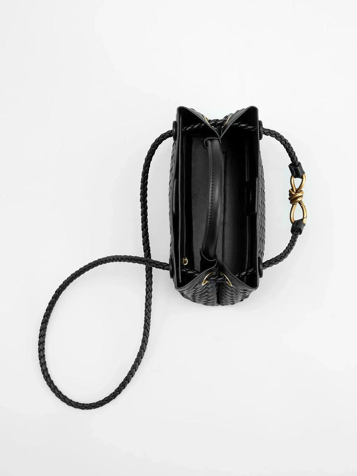 "Maleni tote bag featuring intricate weave pattern with metal accents, a stylish and elegant choice for everyday use."