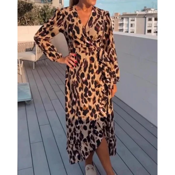 Brown long-sleeve wrap dress with a leopard print pattern, made from soft and comfortable fabric.