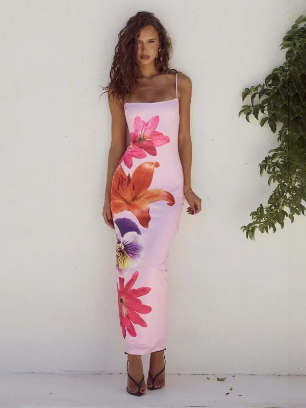 Pink Pandora maxi dress in slim-fit silhouette with floral print. Made with lightweight fabric ideal for spring and summer…