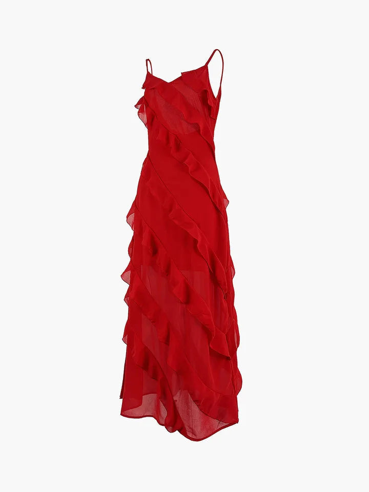 Blue maxi dress with asymmetrical strap and ruffle detail. Flowy and light fabric perfect for summer outings.
