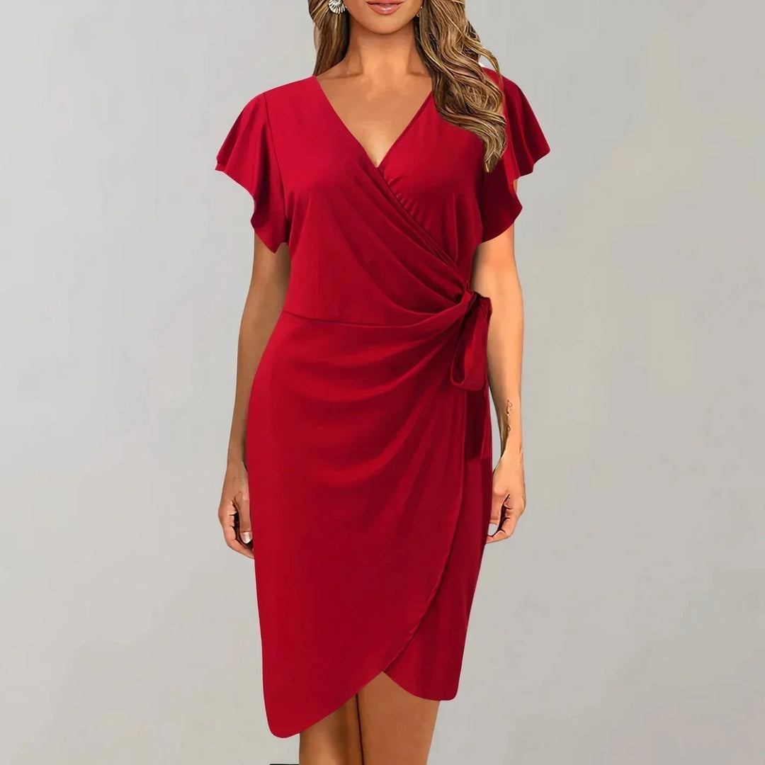 Red V-neck wrap-style flutter sleeve dress made of soft rayon fabric ideal for evening outings or special occasions.