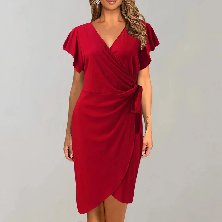 Red V-neck wrap-style flutter sleeve dress made of soft rayon fabric ideal for evening outings or special occasions.