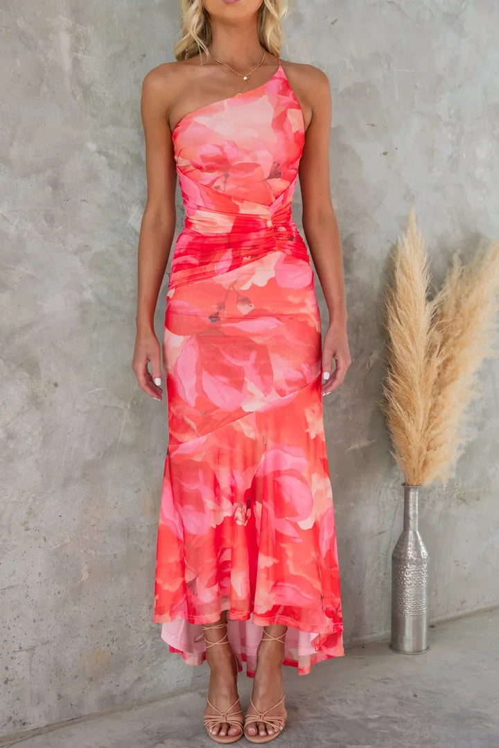 "Strapless blue floral midi dress with elegant pleated design, perfect for summer events and weddings."