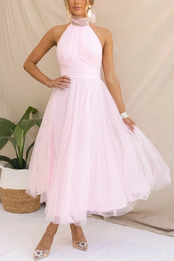 Kayla Halter Neck Pleated Midi Dress in soft lavender chiffon with pleated bodice and flowing skirt.