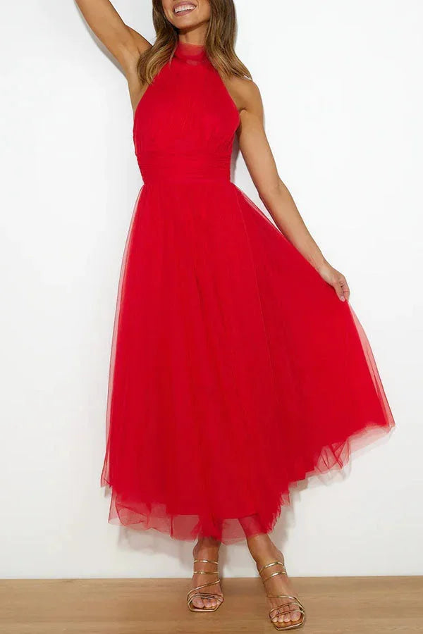 "Kayla halter neck pleated midi dress in soft crepe fabric with a flattering A-line silhouette and intricate pleated…