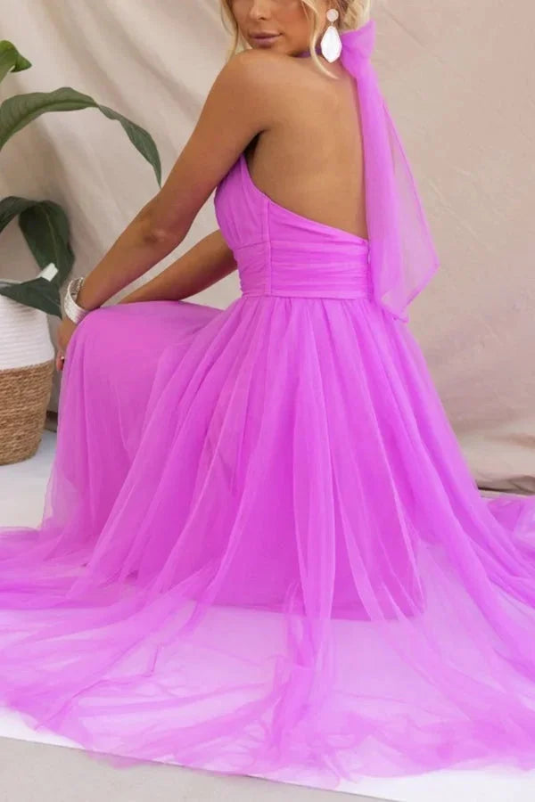 Kayla midi dress in halter neck style with pleated design, ideal for special occasions.