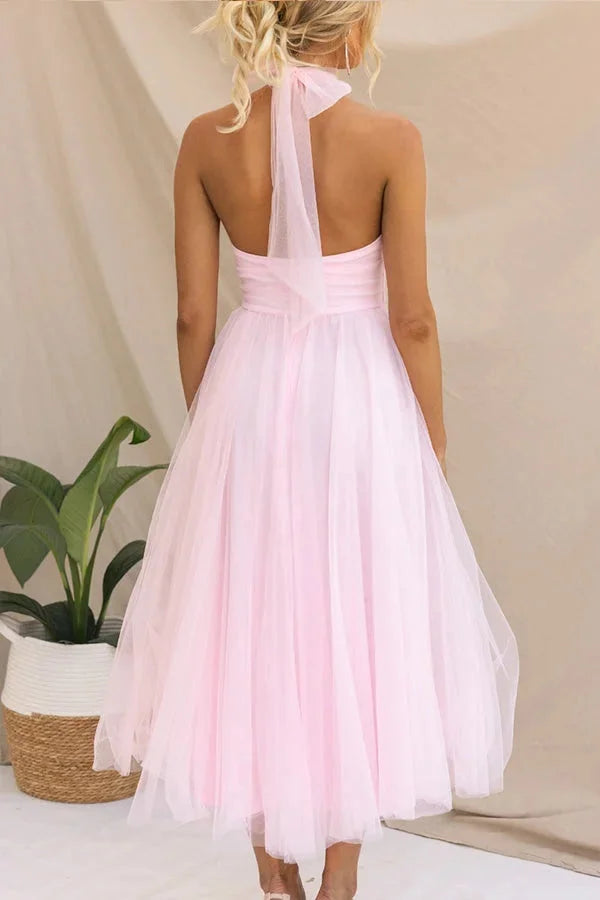"Kayla halter neck midi dress with pleated detailing, perfect for a chic and elegant look"