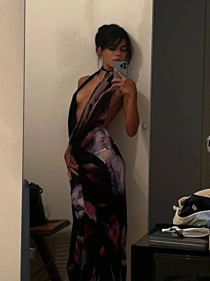 Abstract print halter neck maxi dress in Haislee featuring a flowing silhouette and vibrant colors.