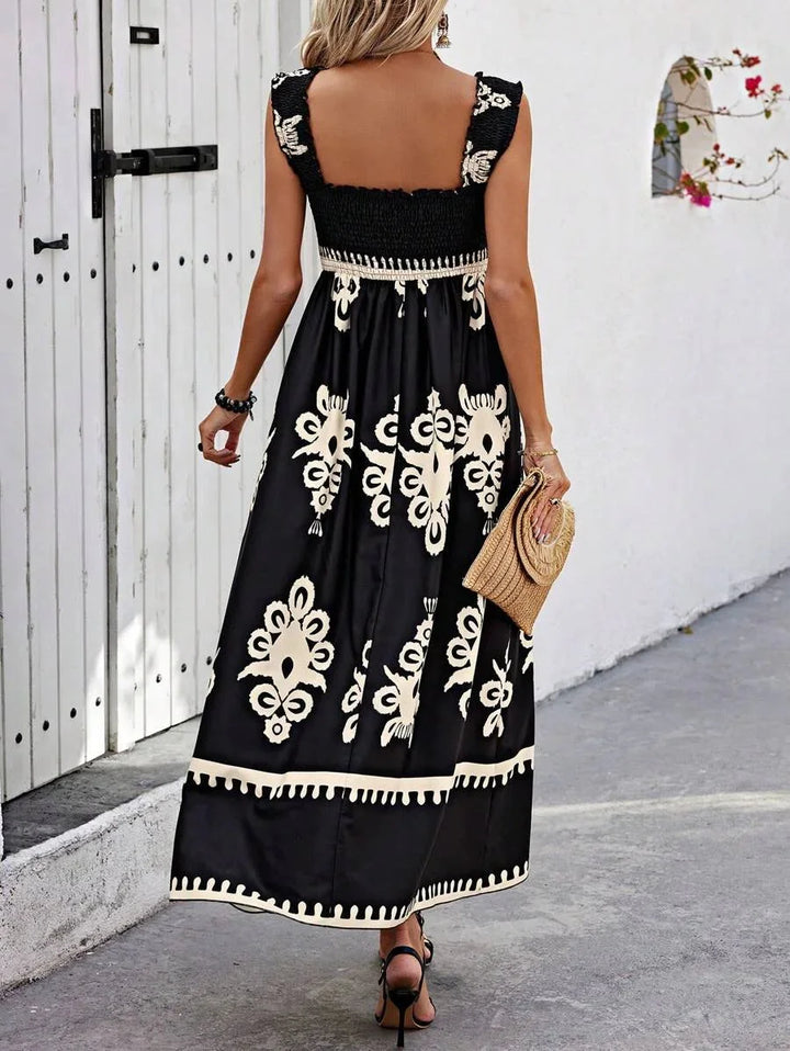"Jovi strapless maxi dress showcasing a bohemian print in a soft, flowing fabric perfect for a casually chic summer…