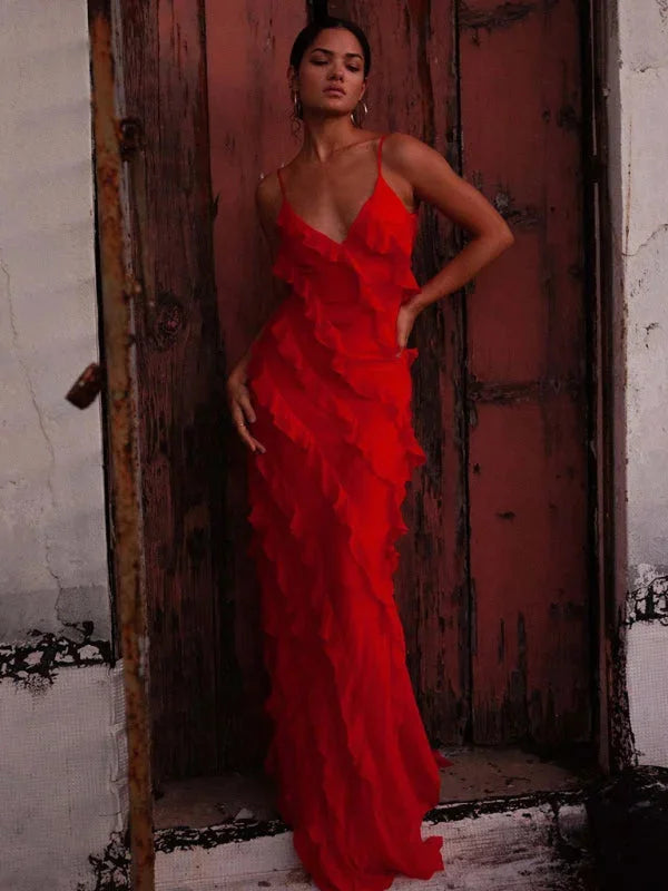 Spaghetti strap tiered ruffle maxi dress in soft, flowy fabric with eye-catching design perfect for warm weather outings.