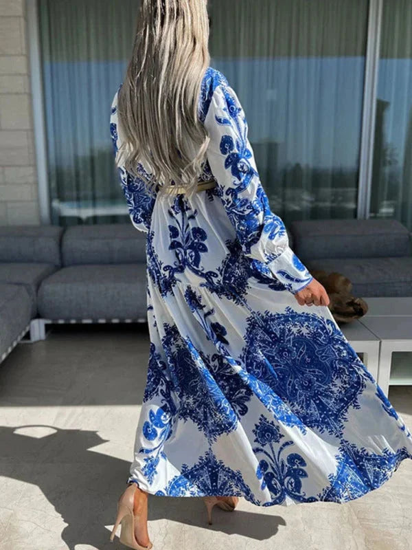 "Elea - Paisley maxi dress features intricate paisley design, high slit, and soft, flowing fabric for a stylish and…