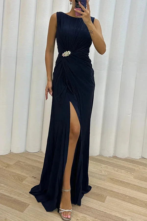 Pleated maxi dress in golden beige with jeweled neckline, sophisticated and elegant design by Mayah.
