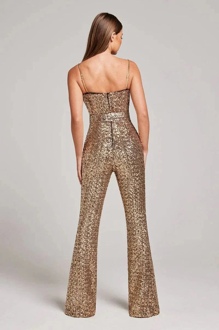 Shimmering black jumpsuit with strapless design, glitter details, and waist belt by Averee.