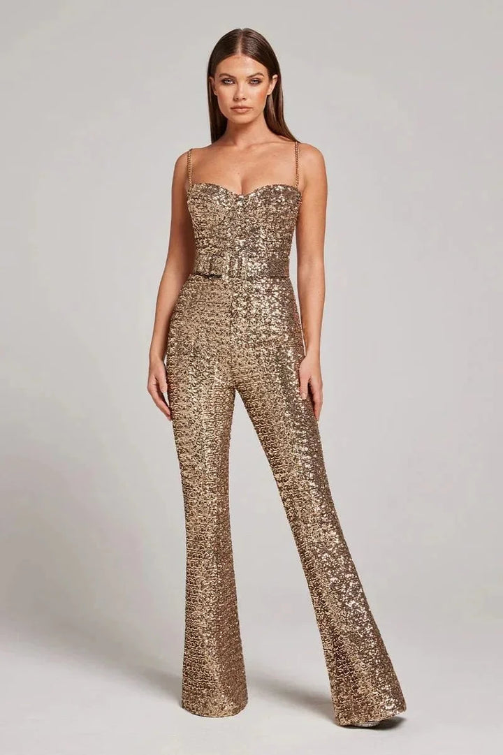 Shimmering Stormy jumpsuit with strapless design and waist belt, perfect for a glamorous night out.
