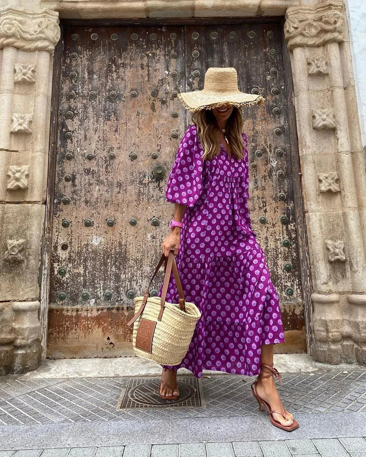 "Maxi dress in Purple with vibrant and playful print design, made of soft and breathable fabric, perfect for effortless…
