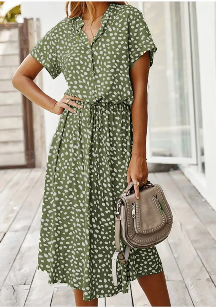 Green polka dot midi dress with waist tie from Ximena. Made of lightweight, flowy fabric perfect for everyday wear or special…