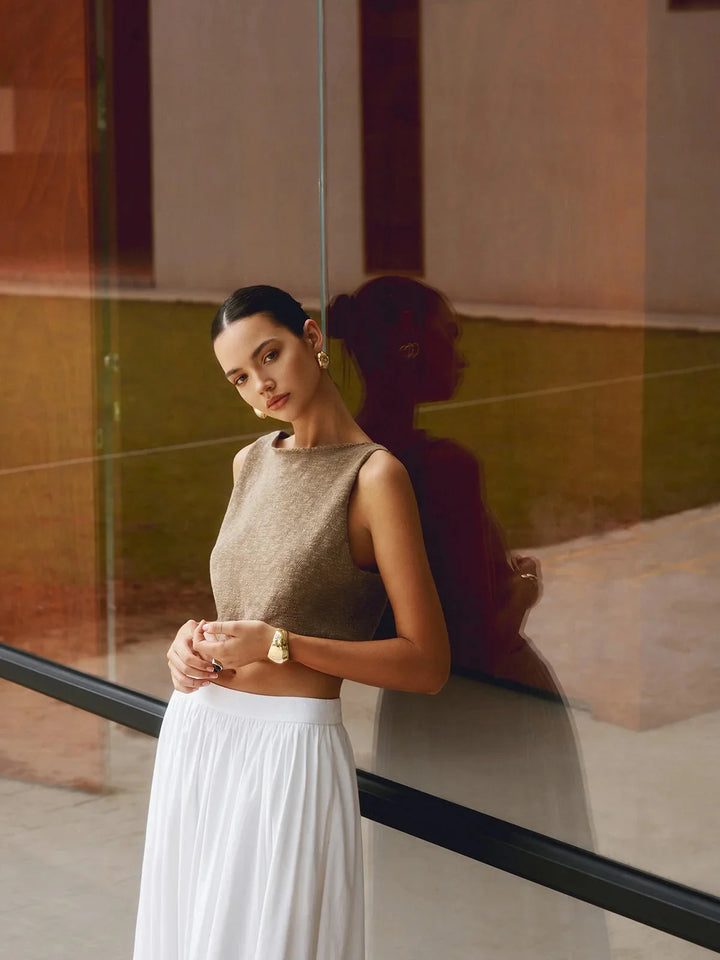 Sleeveless crop top with textured fabric in a sleek, modern design by Viona.