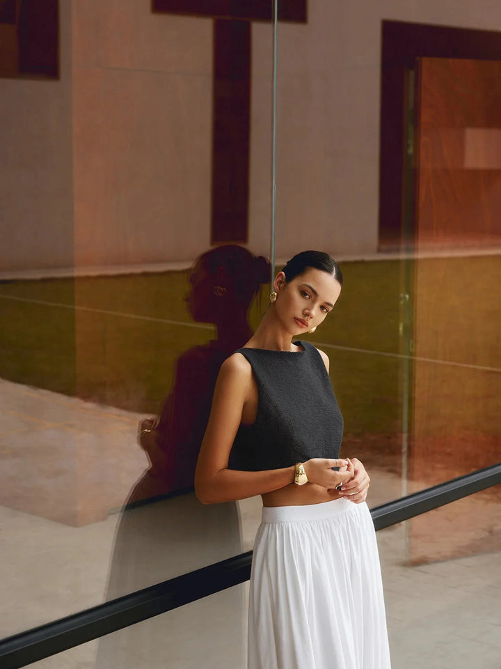 White textured sleeveless crop top with ribbed design and high neckline by Viona - perfect for summer outfits.