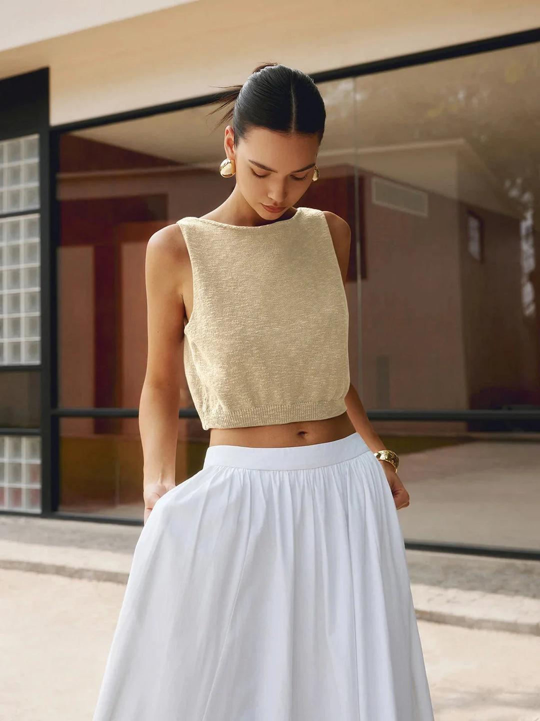 Apricot textured sleeveless crop top with unique design and comfortable material by Viona.
