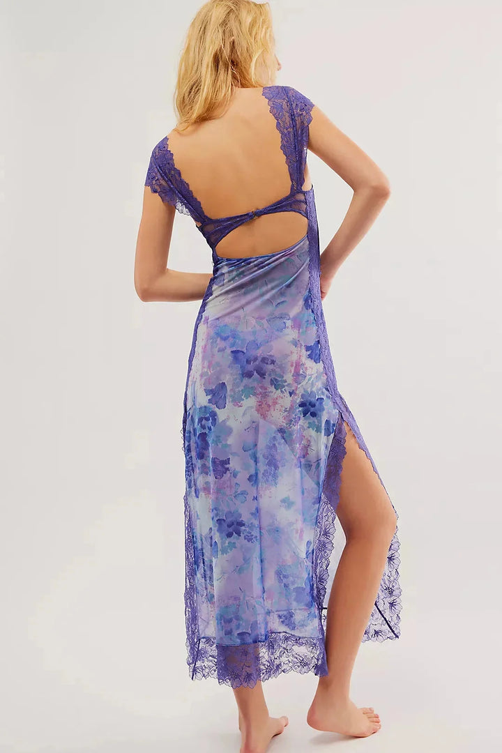 "Abbie sheer maxi dress featuring vibrant floral print, flowing silhouette, perfect for summer days"